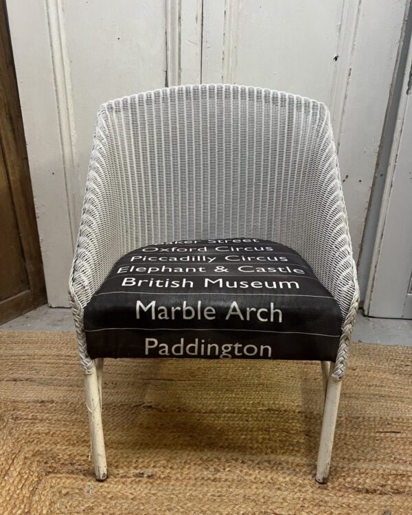 Lloyd loom vintage chair with original bus linen seat