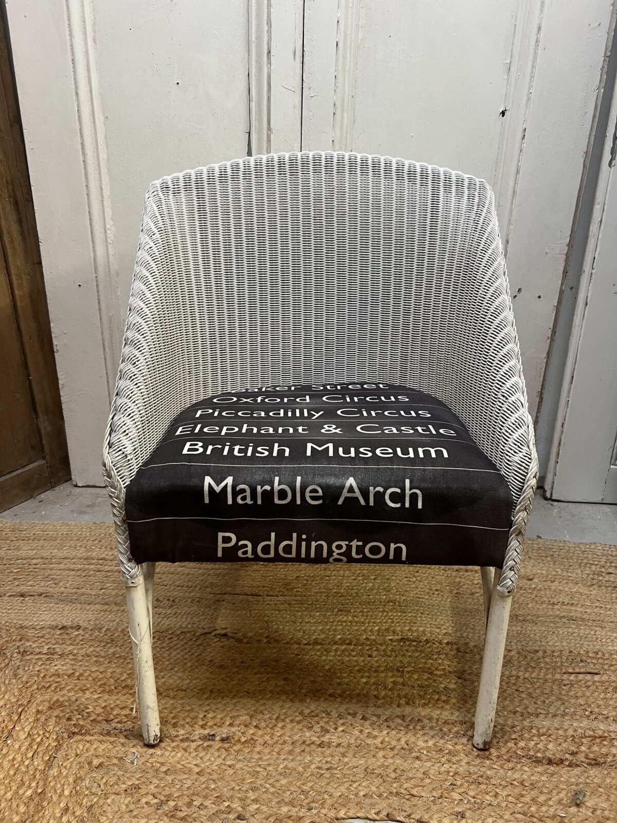 Lloyd loom vintage chair with original bus linen seat