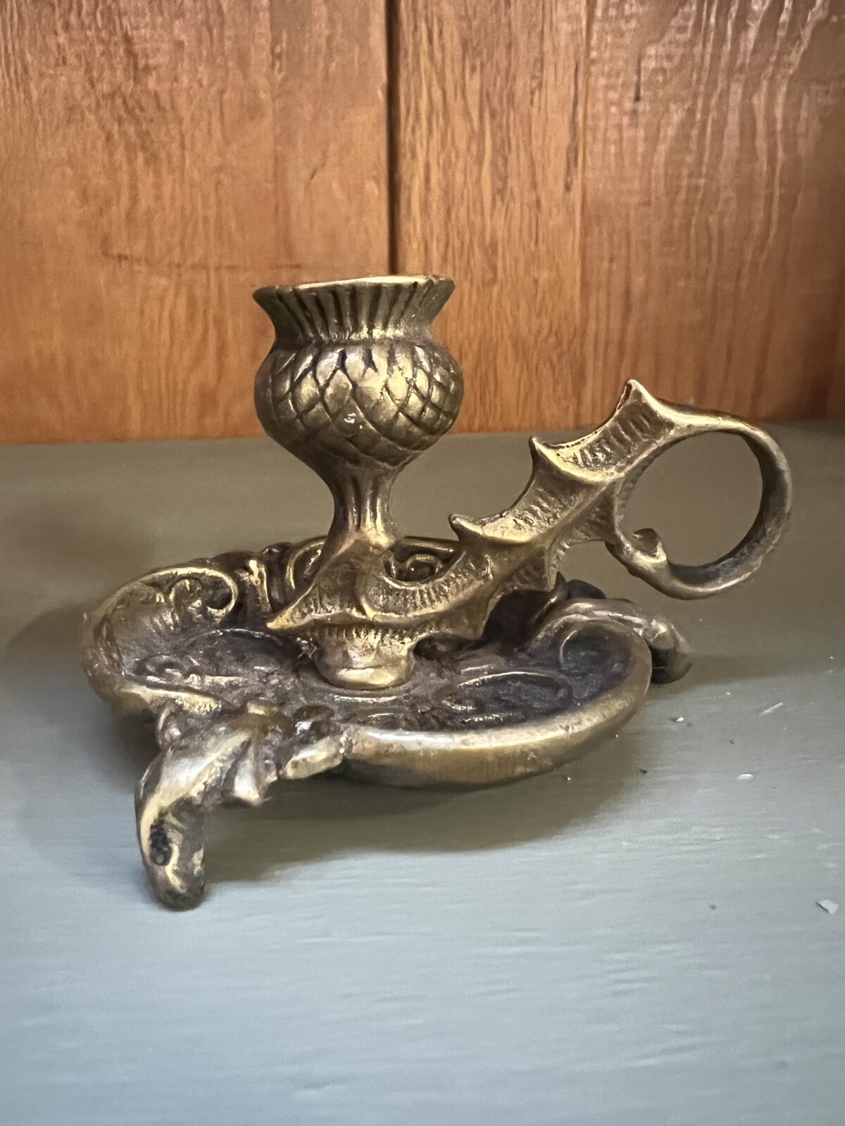 Antique Art Nouveau brass thistle candlestick