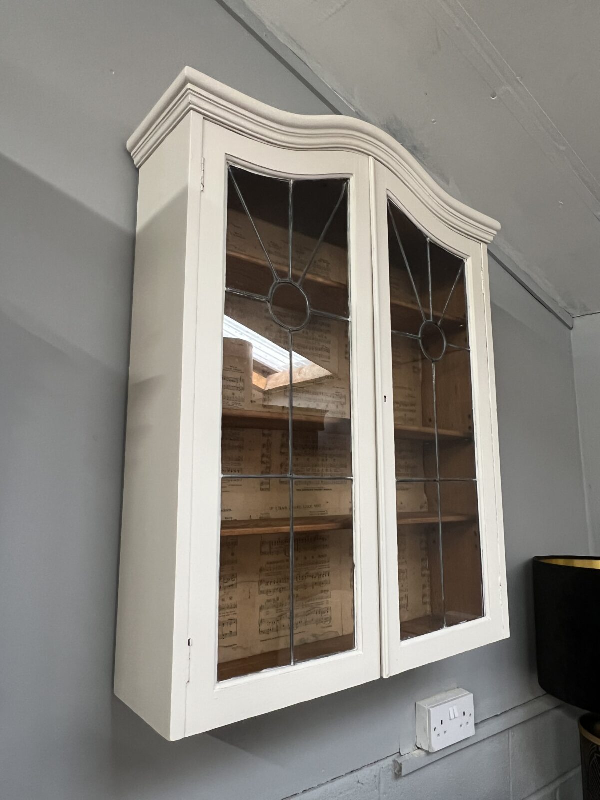 Vintage glazed wall cabinet with leaded glass